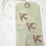 Birds in Flight Embossed Distressed Altered Luggage Style Tag