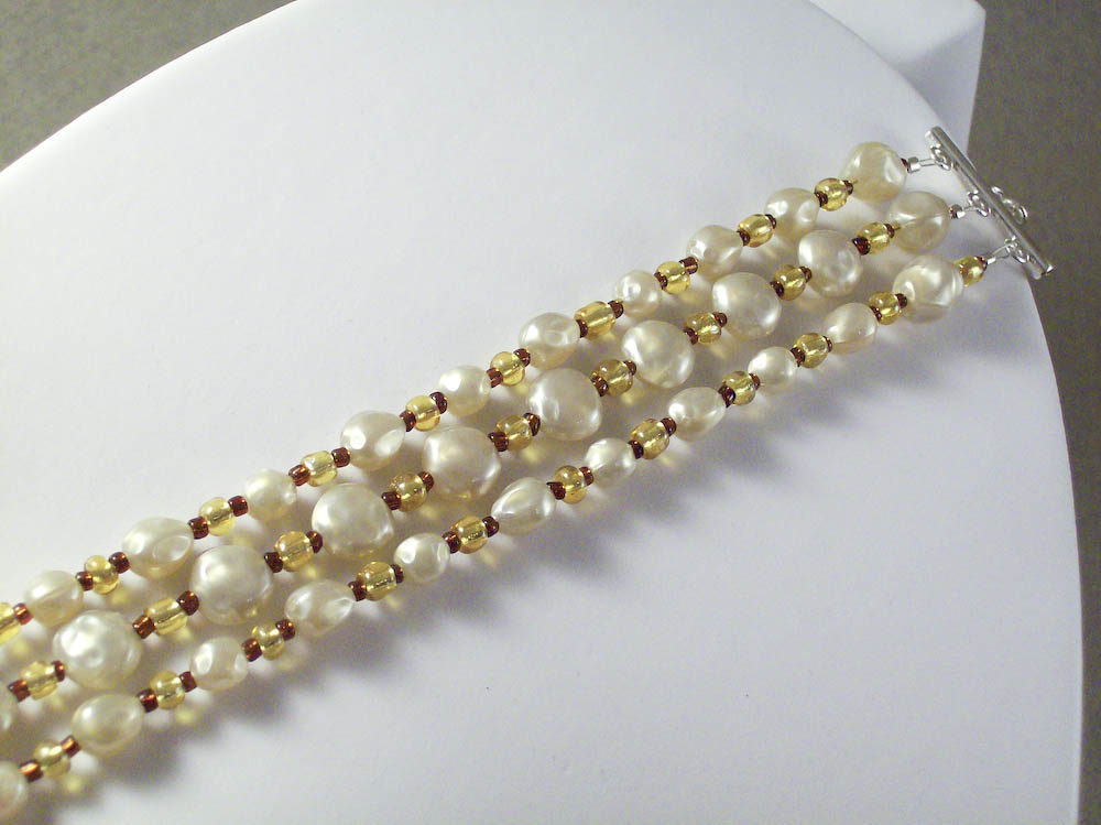 Three strand vintage style acrylic pearl bracelet